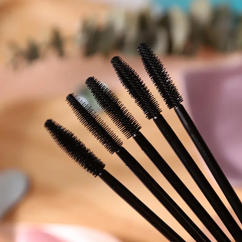 50pcs 일회용 실리콘 속눈썹 브러쉬 스풀 마스카라 완드 빗 스틱 브로우 브러쉬 속눈썹 연장 메이크업 화장품 도구 — image 1