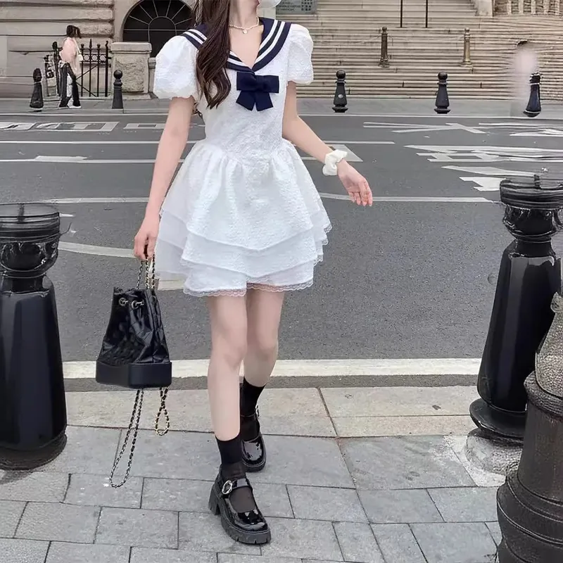 Robe courte à col marin blanc pour femmes, avec nœud bleu marine, manches à bulles, volants à plusieurs niveaux, douce, décontractée, Style mignon — image 4