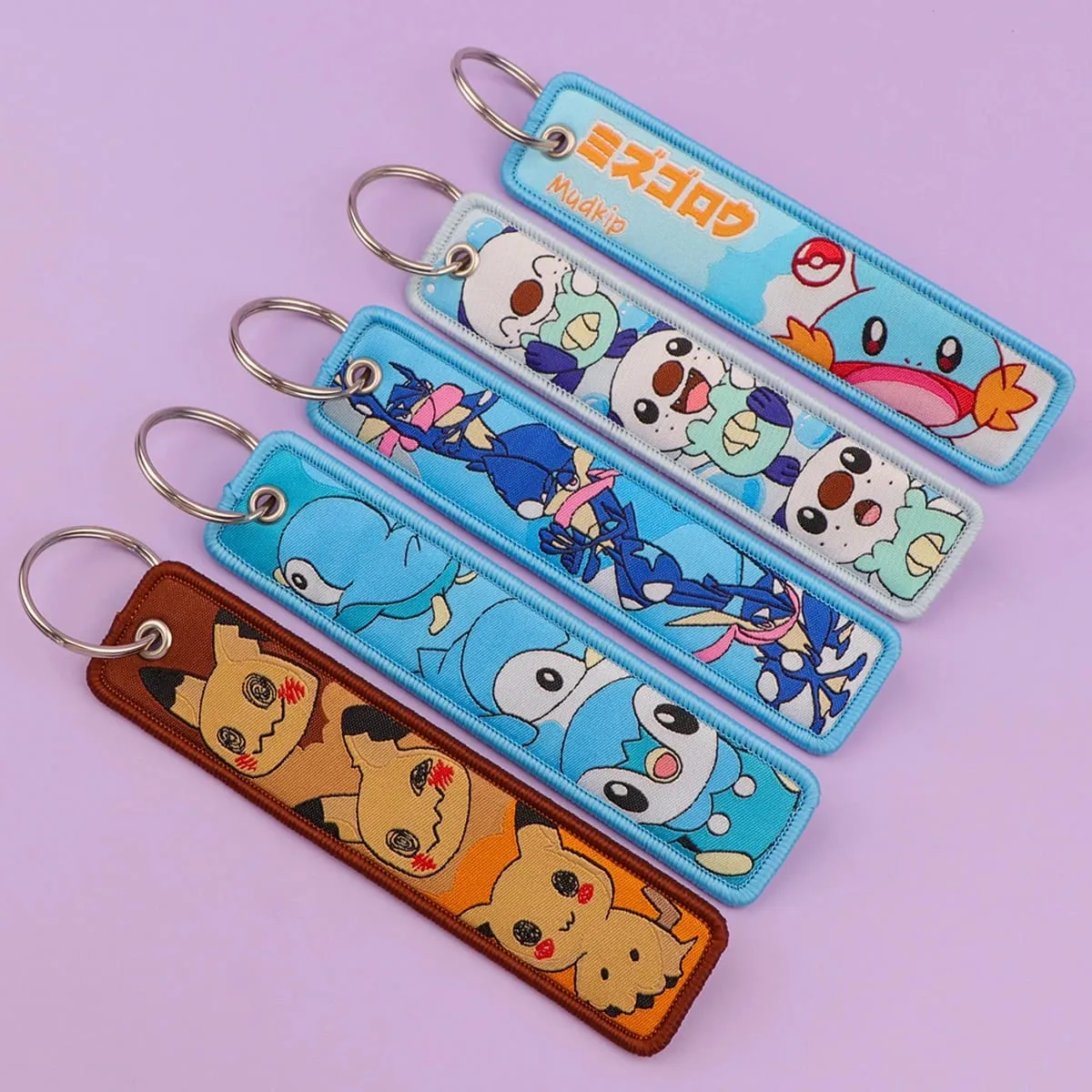 Pokémon Anime elfe monstres porte-clés pour voitures sac à dos porte-clés broderie porte-clés étiquette Jet accessoires cadeaux 1 pièces