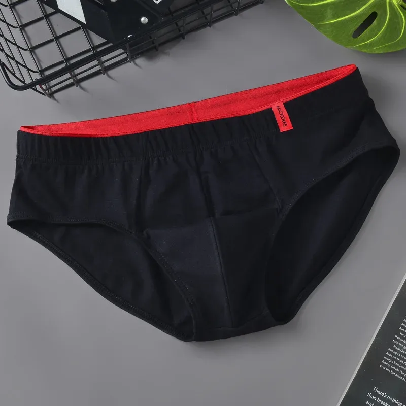 Slip da uomo Slip in cotone tinta unita per giovani Vita comoda e sexy Tendenza esplosione Biancheria intima traspirante Sissy Mutandine