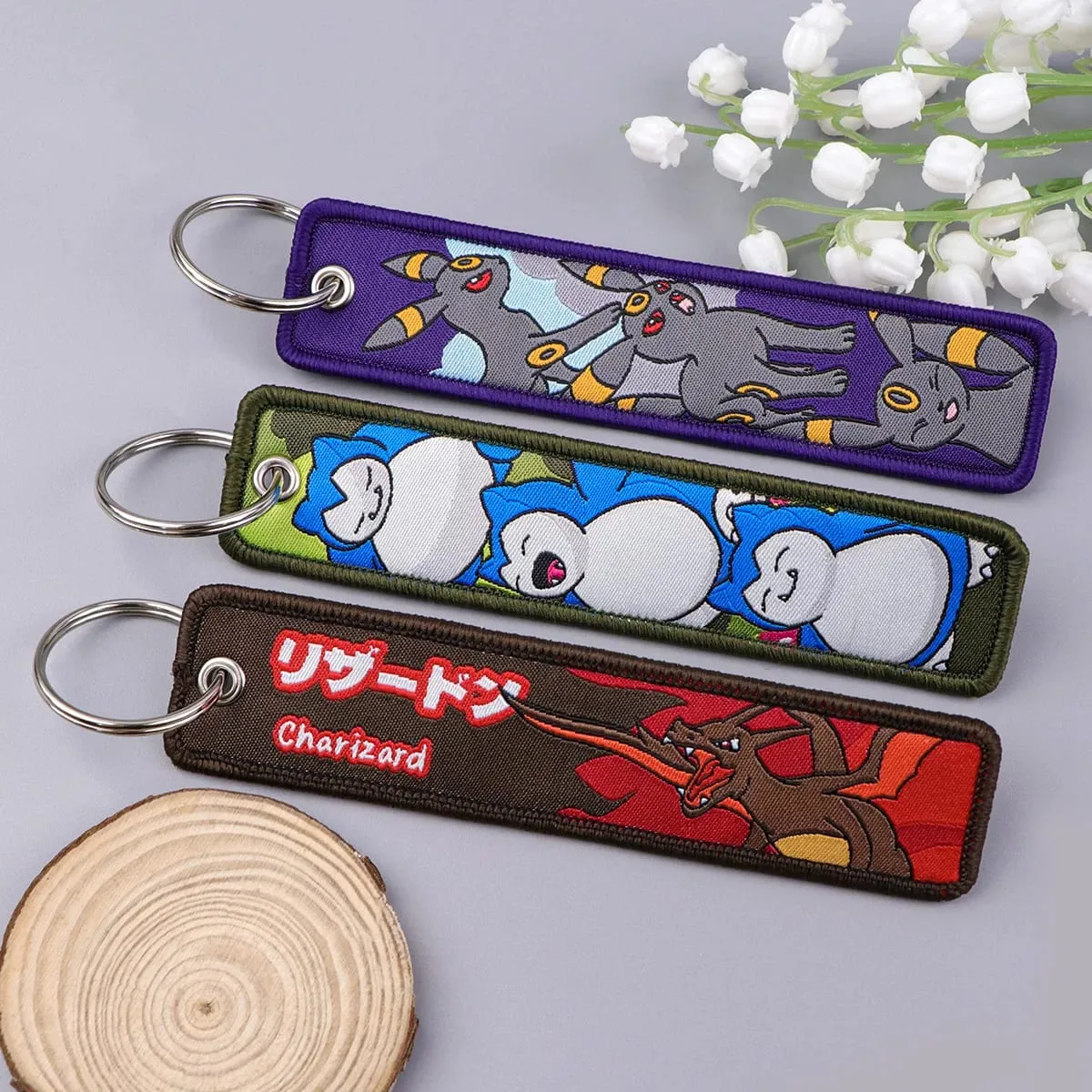 Pokémon Anime elfe monstres porte-clés pour voitures sac à dos porte-clés broderie porte-clés étiquette Jet accessoires cadeaux 1 pièces