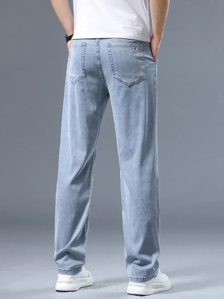 Jeans dritti larghi da uomo sottili estivi Pantaloni casual da lavoro in Lyocell morbido drappeggio Pantaloni di seta grigio fumo Plus Size 40 42