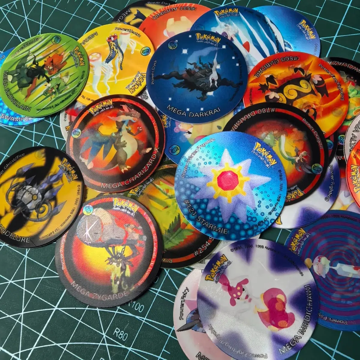 10-90 peças 3d flip pokemon za mega evolução tazos conjunto completo lenticular redondo pogs eco plástico 4cm anime cartas de jogo colecionáveis — image 6
