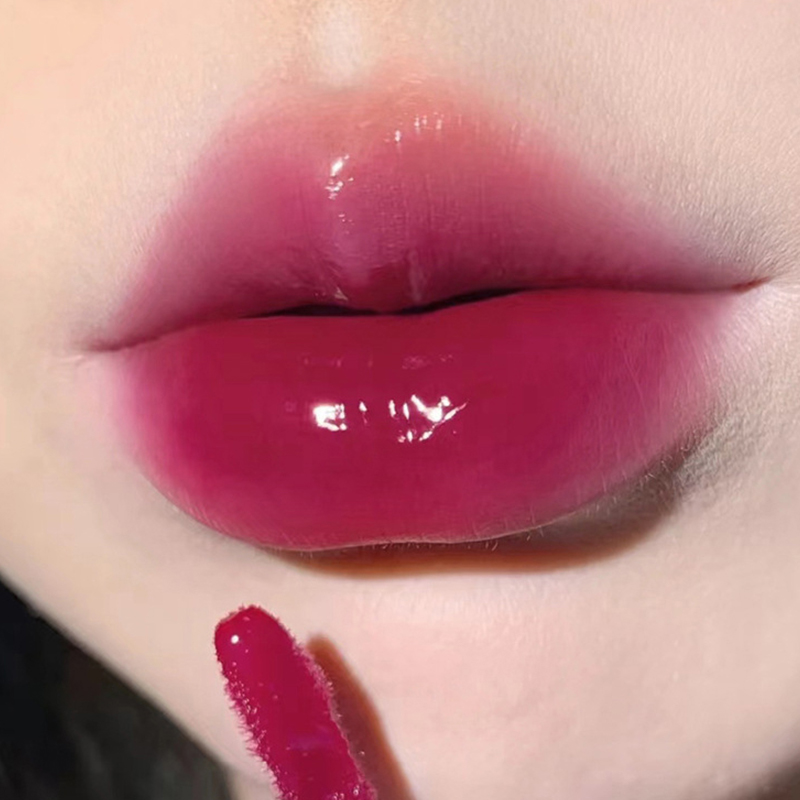 Leichter, glasartiger Lippenlack – feuchtigkeitsspendende Formel mit Spiegelglanz; Wischfest, langlebig und hautaufhellend