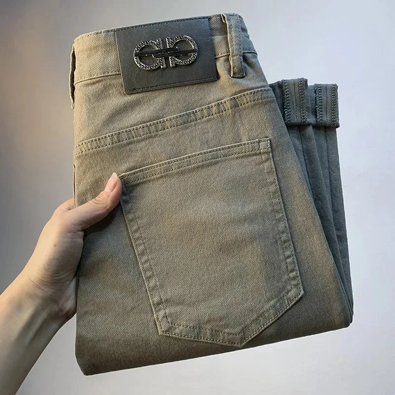 Lette luksus herrejeans 2025 sommer tynd stretch tilspidsede små lige ben afslappet alsidige denim ensfarvede bukser