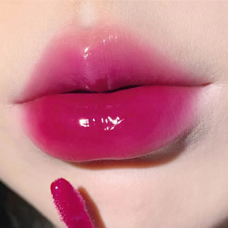 Leichter, glasartiger Lippenlack – feuchtigkeitsspendende Formel mit Spiegelglanz; Wischfest, langlebig und hautaufhellend