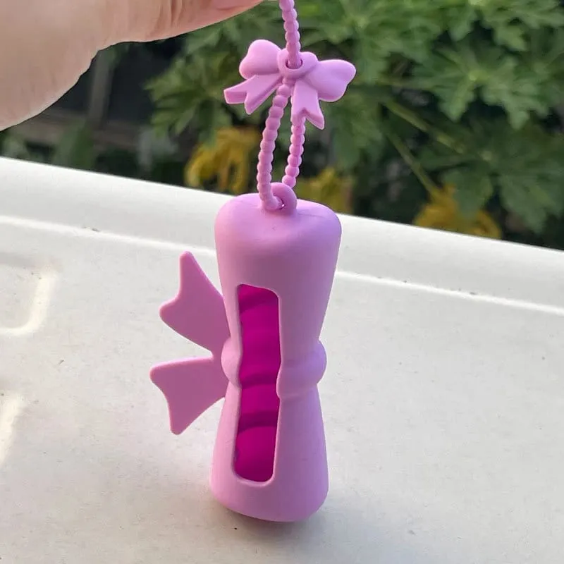 Bow Candy Peanut Shape Silikon Penutup Gincu Rantai Kunci Beg Simpanan Gincu Warna Pepejal Pemegang Balsem Bibir Ringan — image 11