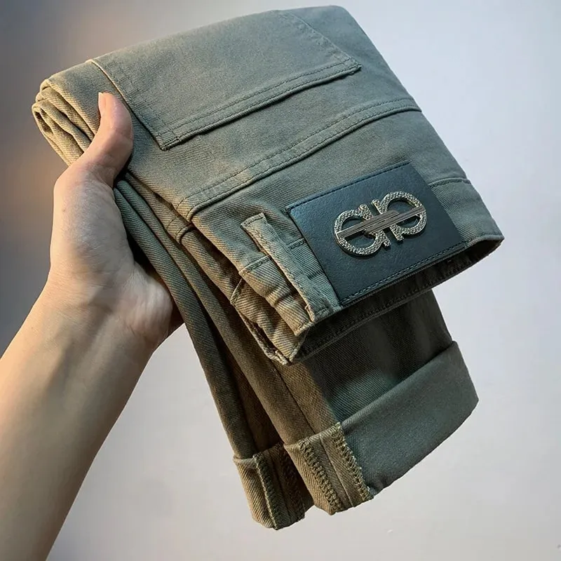 Lette luksus herrejeans 2025 sommer tynd stretch tilspidsede små lige ben afslappet alsidige denim ensfarvede bukser — image 1