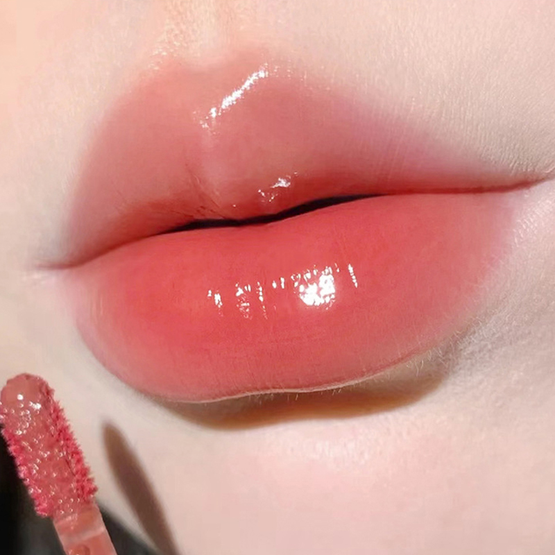 Leichter, glasartiger Lippenlack – feuchtigkeitsspendende Formel mit Spiegelglanz; Wischfest, langlebig und hautaufhellend
