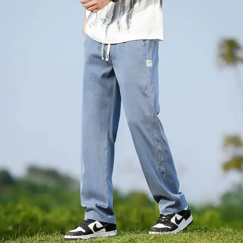 Jeans Kain Lyocell Lembut Musim Panas Pria Celana Denim Lurus Longgar Tipis Celana Panjang Kasual Pinggang Elastis Tali Serut Ukuran Besar M-5XL — image 2