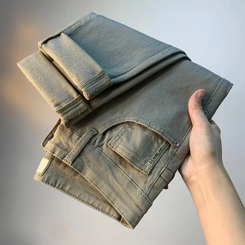 Lette luksus herrejeans 2025 sommer tynd stretch tilspidsede små lige ben afslappet alsidige denim ensfarvede bukser — image 4