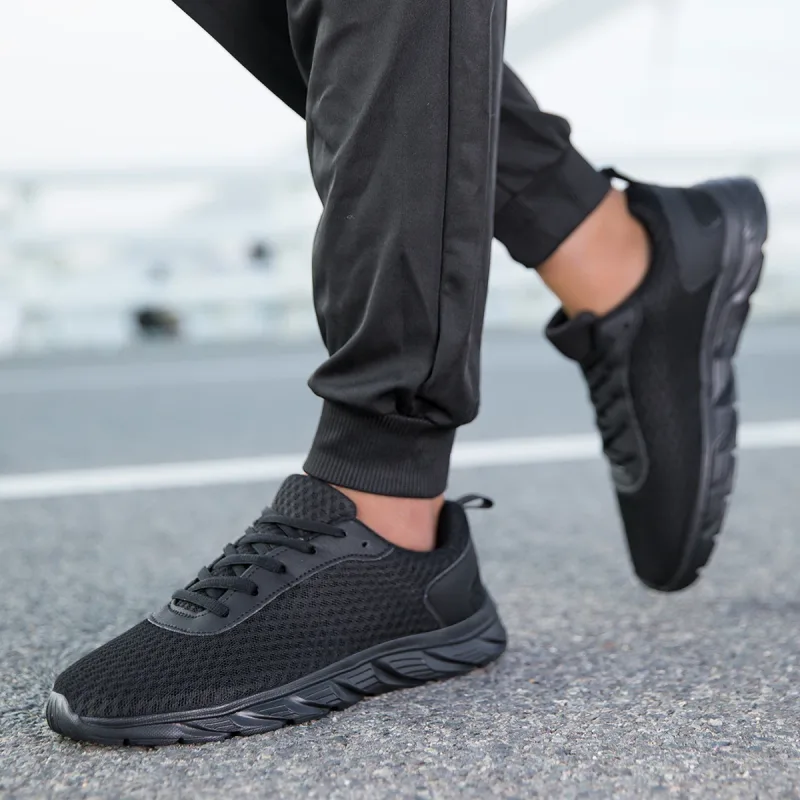 Scarpe da ginnastica da uomo nere solide Tomaia in maglia cava Suola antiscivolo Suola leggera Allenamento da jogging Calzature sportive da viaggio quotidiane casuali — image 5