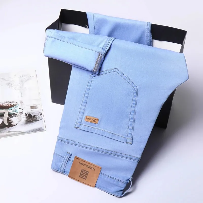 2025 sommer Neue männer Sky Blue Schlank Stretch Jeans Lyocell Dünne Stil Mode Lässig Eis Seide Denim Hosen Männliche marke Hosen