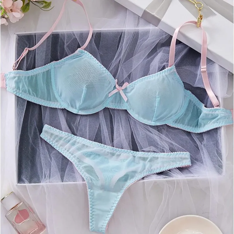 Conjunto de lencería Sexy de encaje ligero semitransparente con tiras finas y empalme de malla azul para mujer
