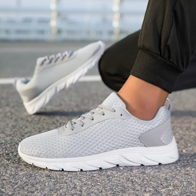 Scarpe da ginnastica da uomo nere solide Tomaia in maglia cava Suola antiscivolo Suola leggera Allenamento da jogging Calzature sportive da viaggio quotidiane casuali — image 8