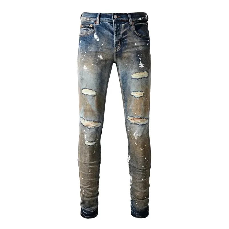 Jeans affusolati slim con strappi multipli da uomo Lavaggio sfumato blu vintage Bottoni con schizzi di vernice bianca Fly High Street Style