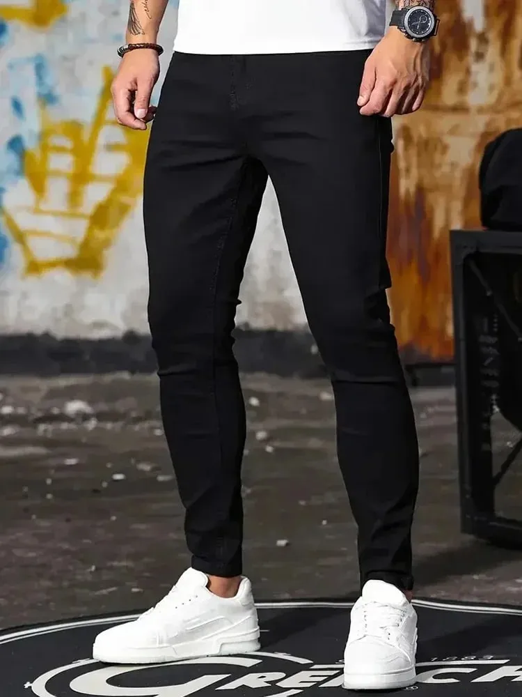 กางเกงยีนส์ผู้ชายยืดกางเกงยีนส์กางเกงสีทึบสีดำสีฟ้าฤดูใบไม้ผลิ Luxury Street Harajuku Hip-Hop สไตล์ SLIM FIT กางเกงยี่ห้อ