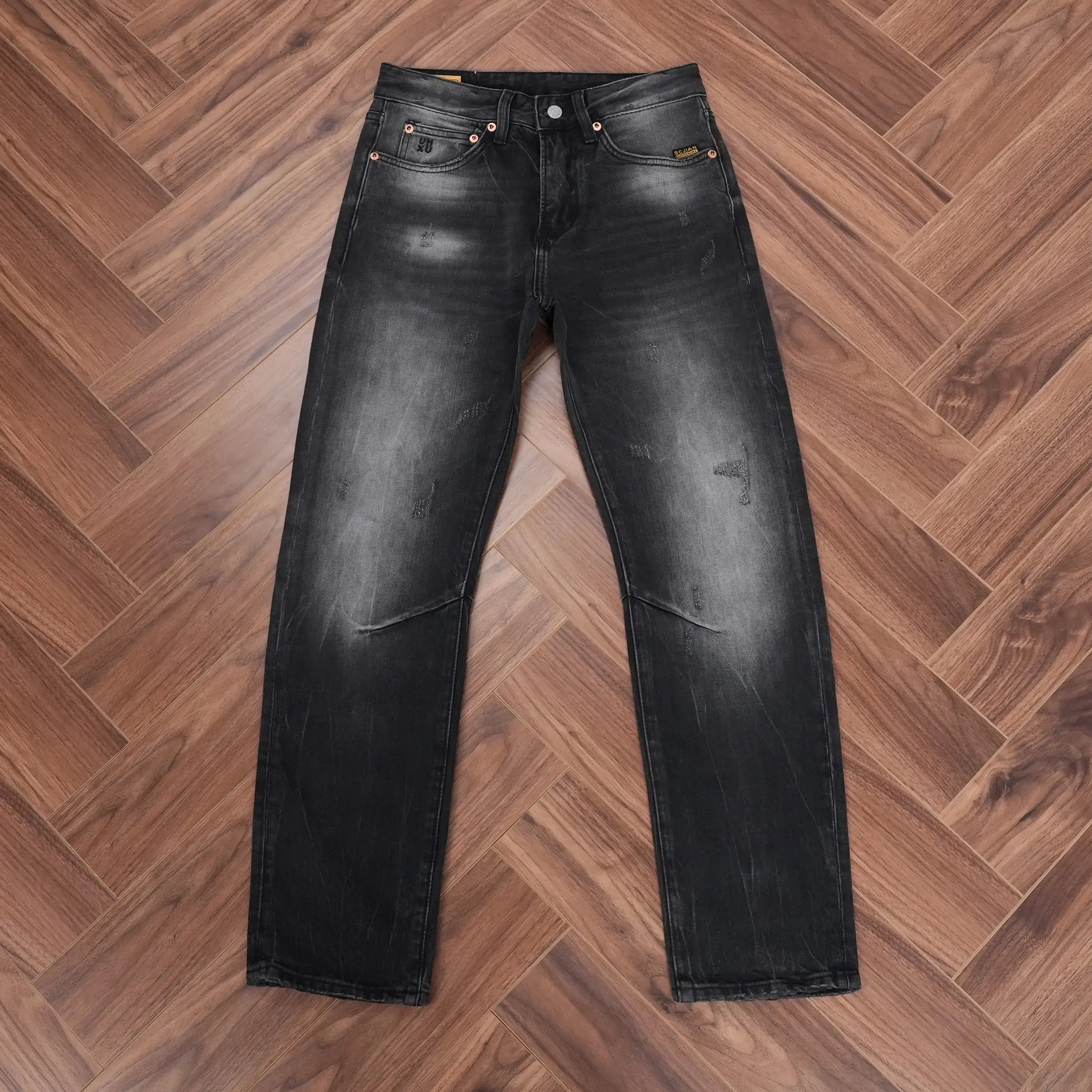 Jeans in denim nero-grigio lavato a molla di alta qualità per uomo Pantaloni casual comodi e dritti dal design invecchiato con buco strappato