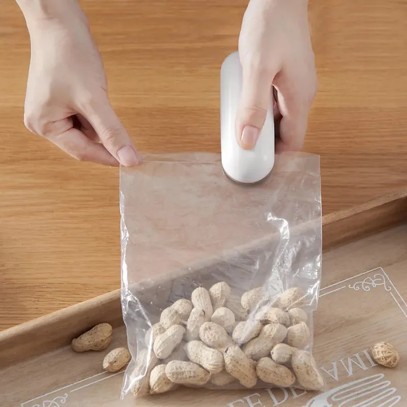 Mini sigillatrice Termosigillatrice portatile Borsa per la conservazione di pacchetti in plastica Pratico adesivo e guarnizioni per accessori da cucina per snack alimentari — image 2