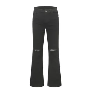 Pantalones vaqueros acampanados ajustados para hombre de calle urbana pantalones vaqueros desgastados blancos y negros en general Y2k pantalones vaqueros ajustados lavados de Color sólido rasgados para hombres