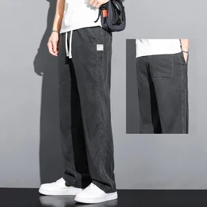 Pantalons texans d'home de teixit lyocell suau d'estiu Pantalons rectes solts i prims amb cordó cintura elàstica Pantalons casuals de Corea Talla més M-5XL